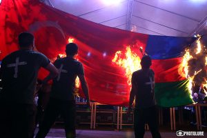 burning flags of Turkey and Azerbaijan